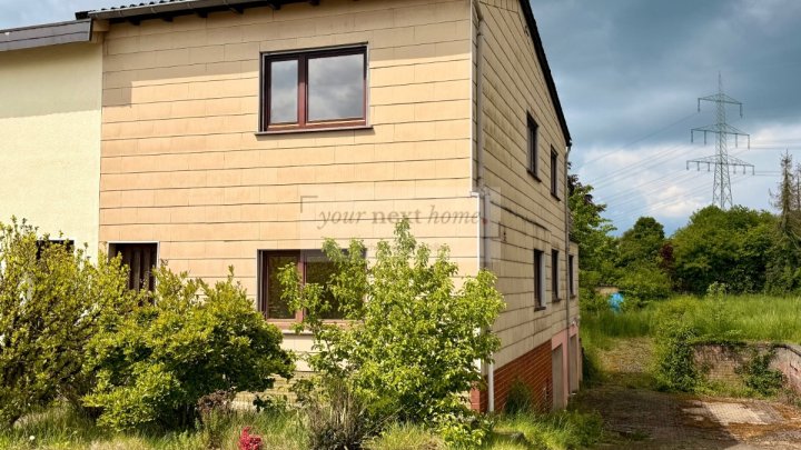 Doppelhaushälfte auf ca. 140 m² Wohnfläche mit großem Grundstück in Schiffweiler