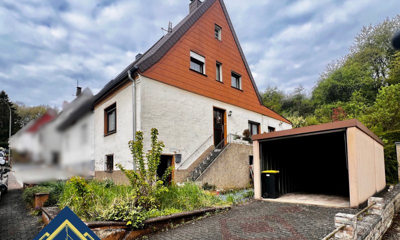 Doppelhaushälfte mit Garten und Garage - Ihr Sanierungsprojekt mit Potenzial in Großrosseln