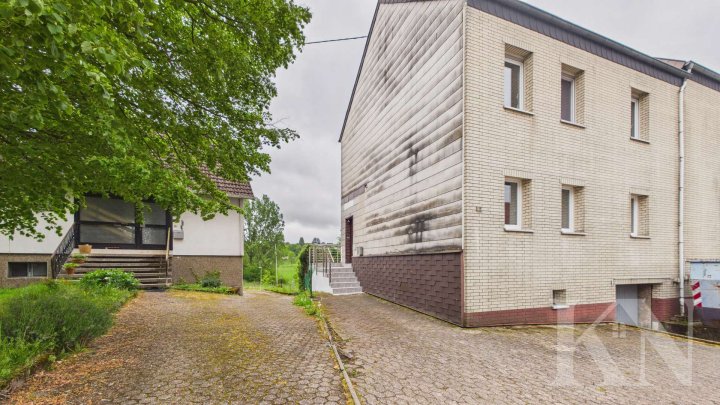 Gepflegte Doppelhaushälfte mit Garten & Ausbaupotenzial in Uchtelfangen