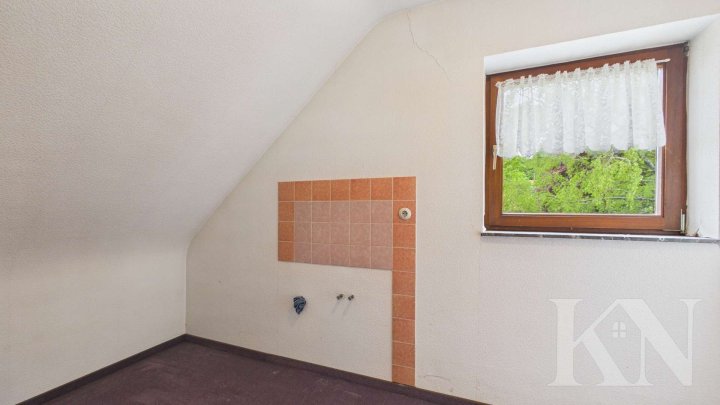Einfamilienhaus mit großem Grundstück und vielseitigem Potenzial