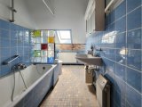 Tageslicht-Bad mit Badewanne im Obergeschoss