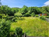Blick vom rückwärtigen Balkon in den Garten