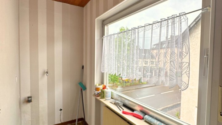 Gepflegtes 2-Familienhaus mit Garten + Garage, teilsaniert
