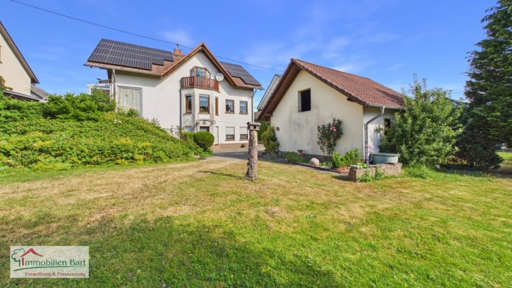 ORSCHOLZ: WOHNHAUS MIT 4 SCHLAFZ., GR. GARAGE, GARTEN IN TOP WOHNLAGE!