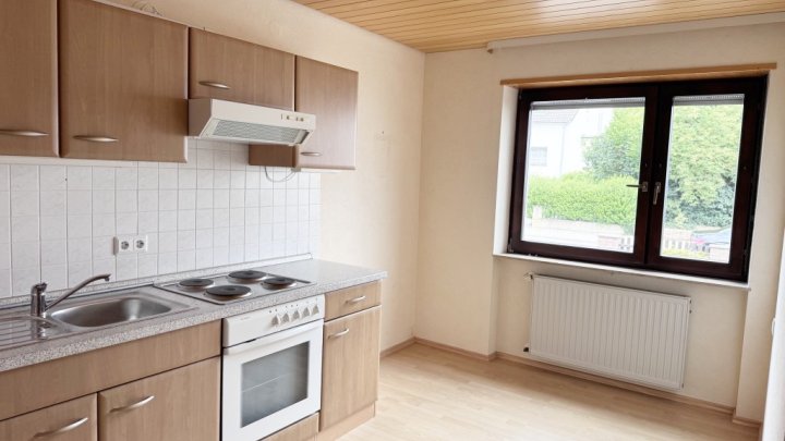 1-2 Fam. Haus  mit kl. Terrasse, Balkon & Garage in Saarbrücken-Ensheim!