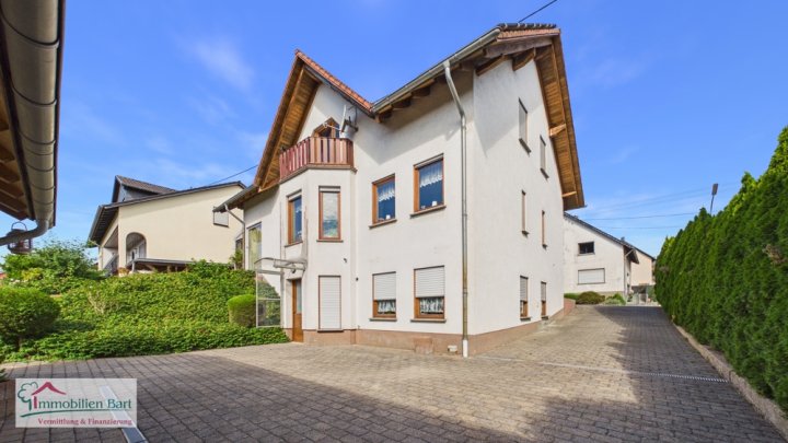 ORSCHOLZ: WOHNHAUS MIT 4 SCHLAFZ., DOPPELGARAGE, GARTEN IN TOP WOHNLAGE!