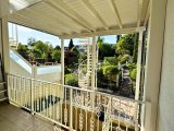 Überdachter Balkon EG