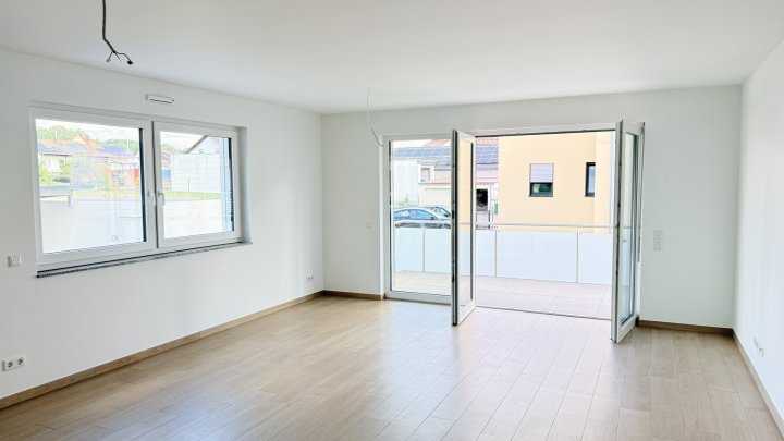 Großzügige Neubauwohnung mit Balkon und 2 Stellplätzen in zentraler Lage von Siersburg zu vermieten