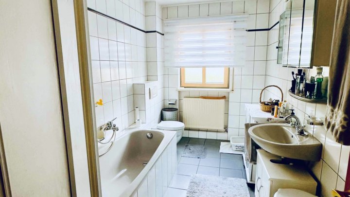 Gepflegte 3-ZKB-Erdgeschosswohnung mit Terrasse, Gartenanteil & Garage in Püttlingen zu verkaufen