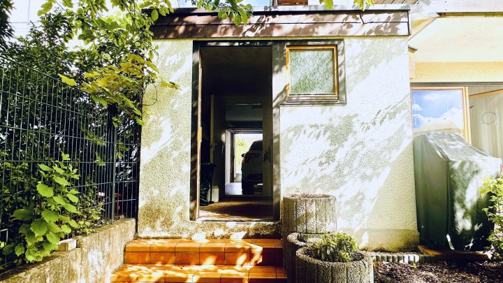 Gepflegte 3-ZKB-Erdgeschosswohnung mit Terrasse, Gartenanteil & Garage in Püttlingen zu verkaufen