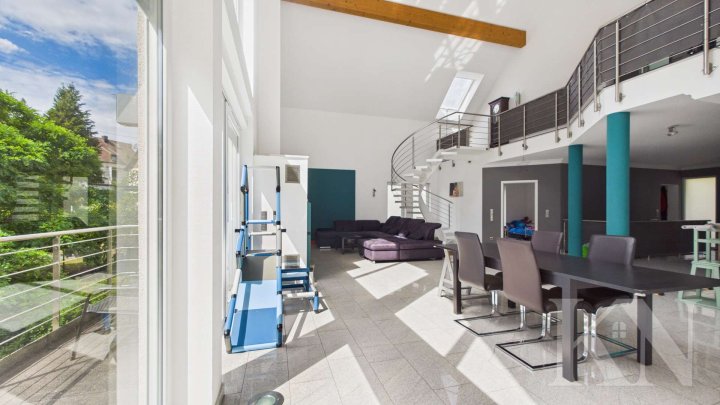 Besondere Architektur trifft großzügiges Wohnen – Einfamilienhaus mit Einliegerwohnung
