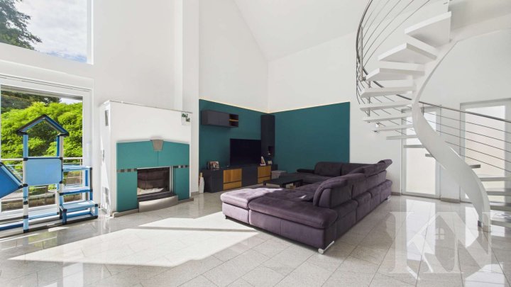 Besondere Architektur trifft großzügiges Wohnen – Einfamilienhaus mit Einliegerwohnung