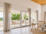 Beispiel - Wohnzimmer mit Zugang zum großen Balkon