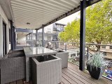 Überdachter Balkon