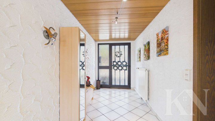 Ein- bis Zweifamilienhaus mit großem Grundstück, zwei Balkonen und Ausbaupotenzial in Gersheim!