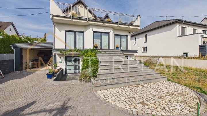 Modernisiertes Einfamilienhaus mit sonniger Dachterrasse