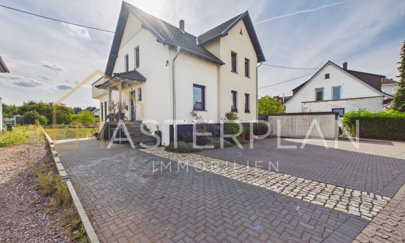 Modernisiertes Einfamilienhaus mit sonniger Dachterrasse
