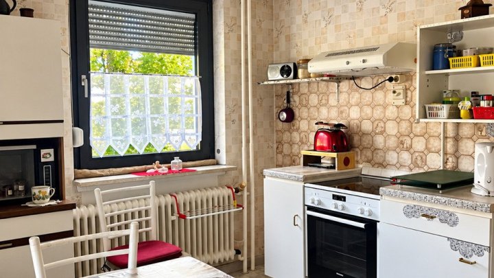  Sanierungsbedürftiges Reihenendhaus mit 2 Garagen in ruhiger Wohnsiedlung - Viel Platz und Gestaltungspotenzial in Völklingen-Ludweiler