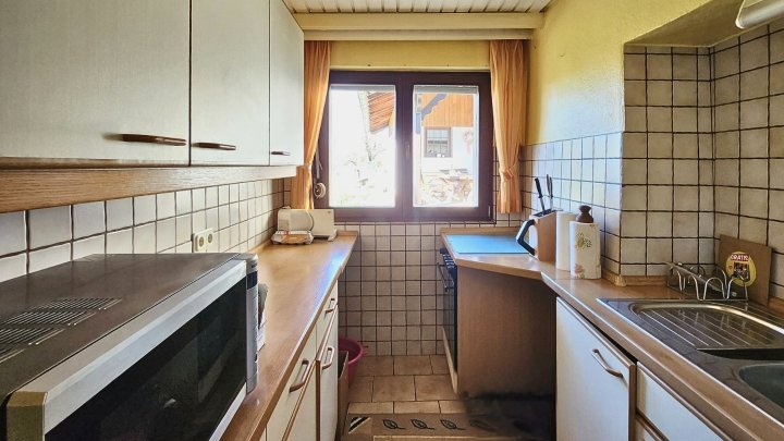 Freistehendes Zweifamilienhaus mit parkähnlichem Grundstück