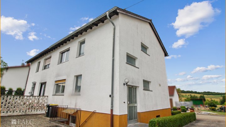 Glückliches Familienhaus mit Blick ins Grüne!