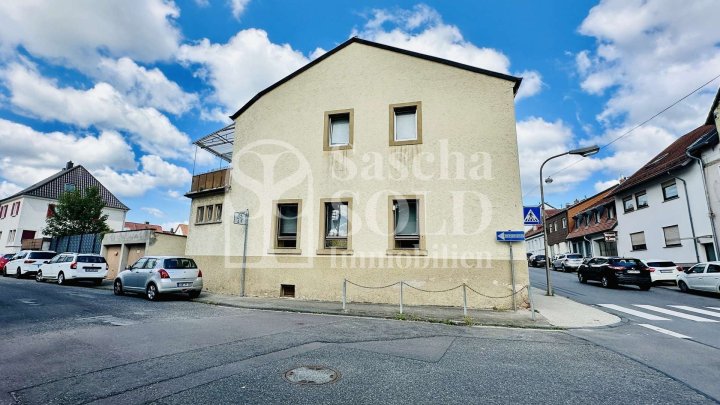 Wohn- und Geschäftshaus in St. Ingbert - für Investoren - mit Wohnung, Gewerbe, Garten und Garagen