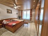 Eltern - Schlafzimmer mit Zugang zum Balkon
