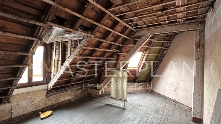 Vielseitiges Mehrfamilienhaus mit Gewerbeeinheit im Herzen von Wadern