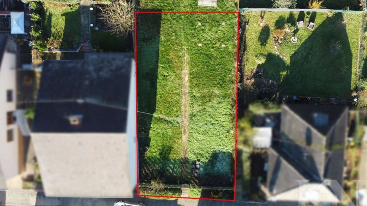 Baugrundstück mit Baugenehmigung – Zweifamilienhaus in Aussicht!