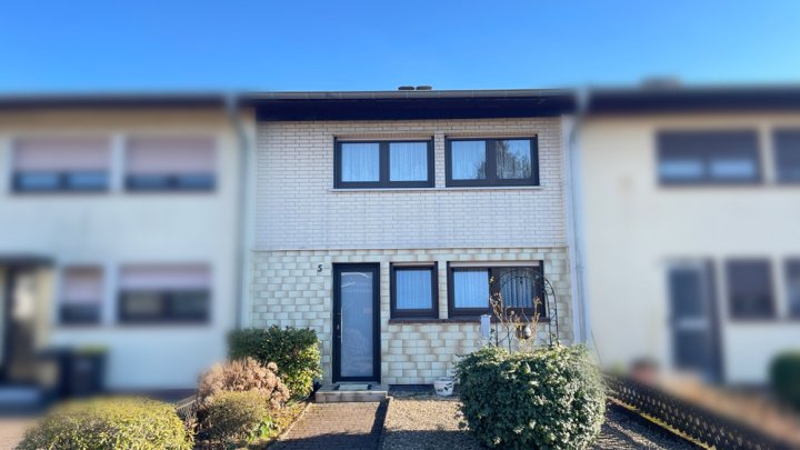 Kleines Reihenhaus mit Garten und Garage in Lockweiler