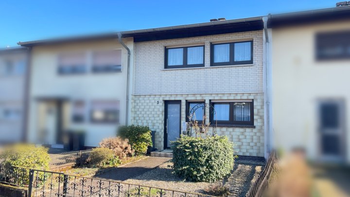 Kleines Reihenhaus mit Garten und Garage in Lockweiler