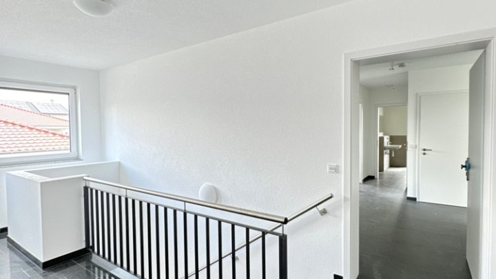 Erstbezug 3-ZKB mit Terrasse, provisionsfrei in nachhaltig effizientem MFH