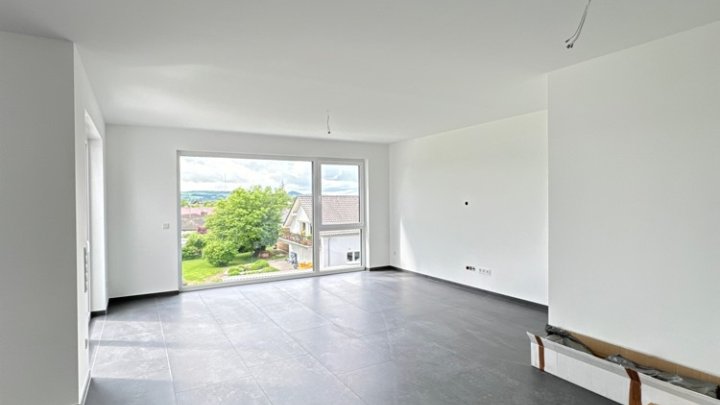 Erstbezug 3-ZKB mit Terrasse, provisionsfrei in nachhaltig effizientem MFH