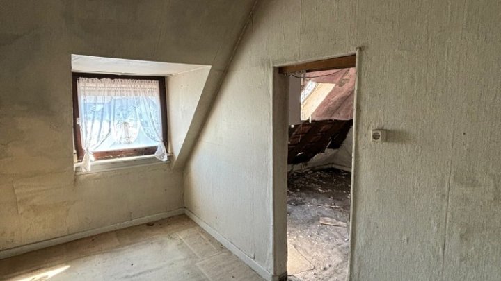 Historisches 2-3 Familienhaus mit Ausbaupotential zur Kernsanierung