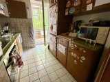 Küche mit Ausgang zum Balkon