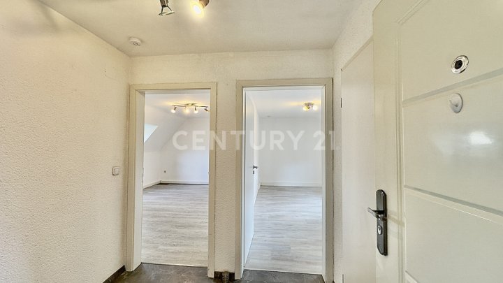Charmante 2-ZKB-Dachgeschosswohnung mit Einbauküche & Gartennutzung