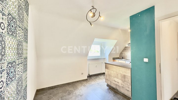 Charmante 2-ZKB-Dachgeschosswohnung mit Einbauküche & Gartennutzung