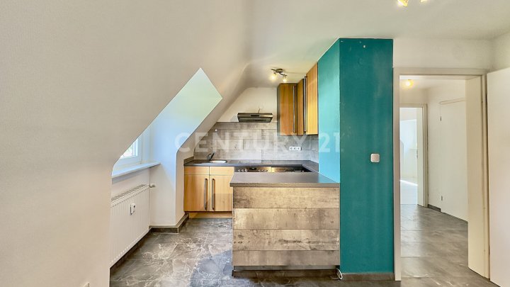 Charmante 2-ZKB-Dachgeschosswohnung mit Einbauküche & Gartennutzung