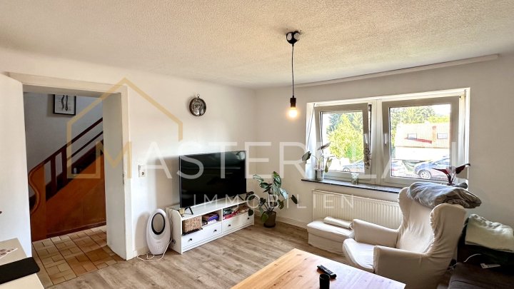 Einfamilienhaus mit Garten – teils modernisiert, aktuell vermietet