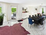 Zugang zum Garten vom gemütlichen Wohnbereich