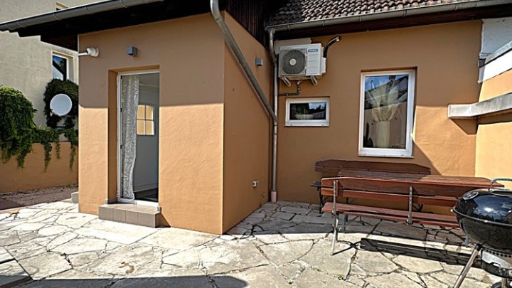 Wohn- und Geschäftshaus plus Nebengebäude und Grundstück