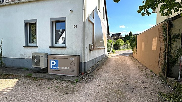 Wohn- und Geschäftshaus plus Nebengebäude und Grundstück
