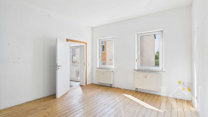 Wohnen mit Mehrwert: Doppelhaushälfte + separates Baugrundstück