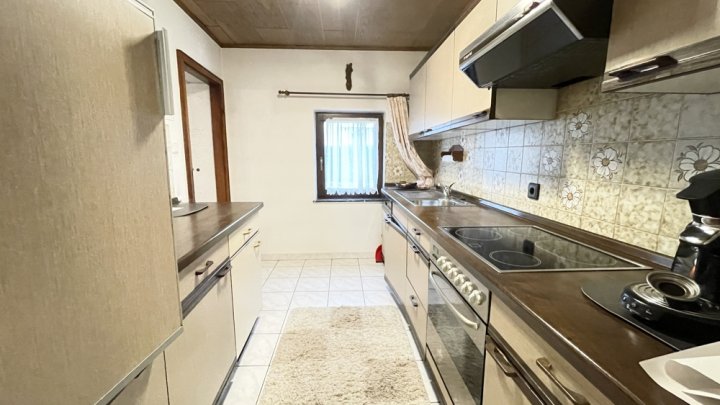 Einfamilienhaus mit schönem Garten – ruhig gelegen mit Stellplatz