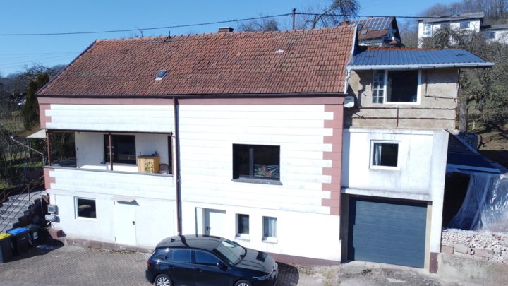 Einfamilienhaus mit Garten, Garage und Stellplatz – Viel Potenzial für Ihre Ideen