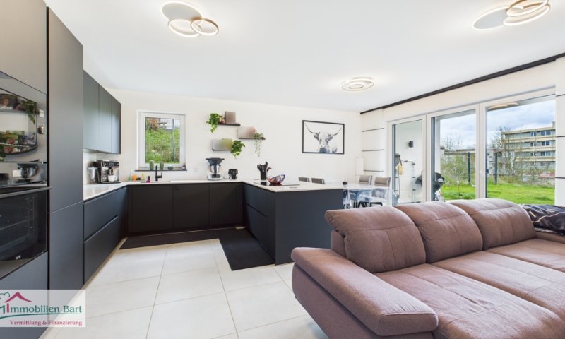 ATTRAKTIVE NEUBAUWOHNUNG MIT GARTEN UND GARAGE IN TOP LAGE!