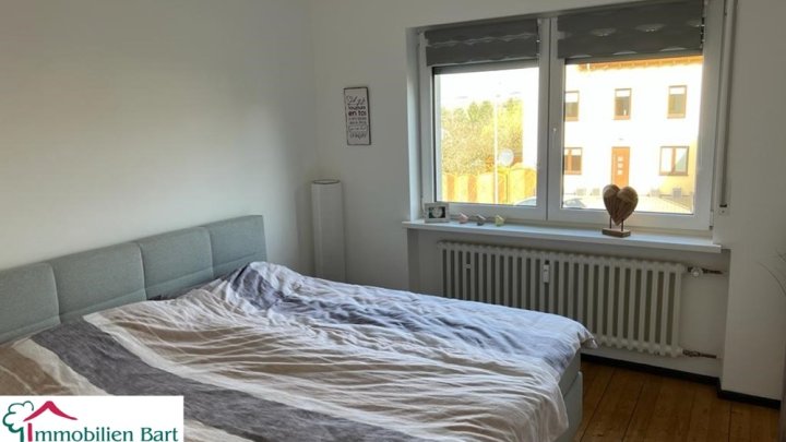 GRENZE L-WORMELDANGE: 3 WOHNUNGEN MIT GARAGEN UND GARTEN