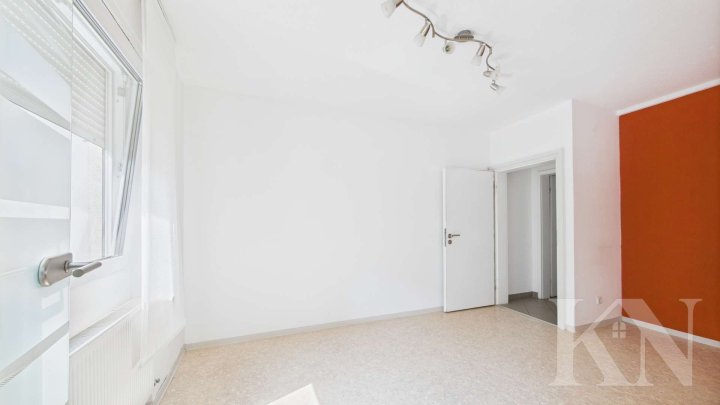 Zentrale Stadtlage: Vielseitiges Mehrfamilienhaus mit Arztpraxis!