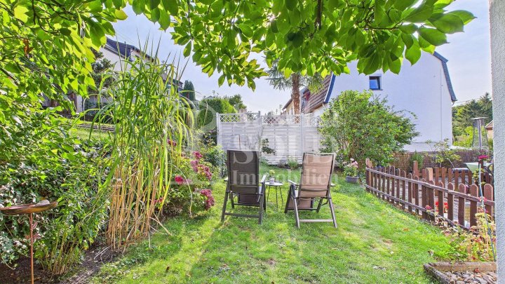 Modernisiertes, familienfreundliches Reihenendhaus mit 7Zimmer in Bildstock mit Garten & Garage