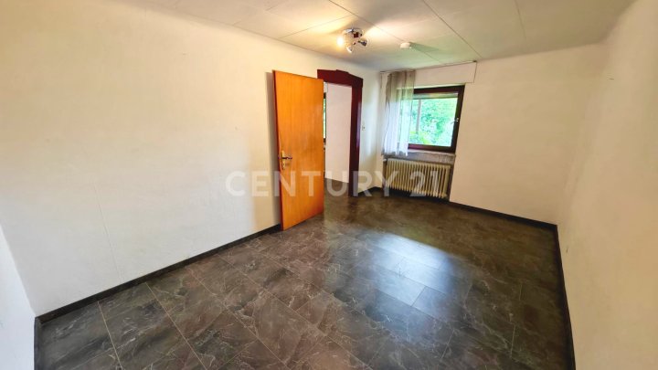 Saniertes 250m€ 1-4 Familienhaus mit grüner Oase im Zentrum von Heusweiler mit Garage