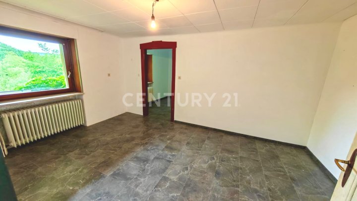 Saniertes 250m€ 1-4 Familienhaus mit grüner Oase im Zentrum von Heusweiler mit Garage